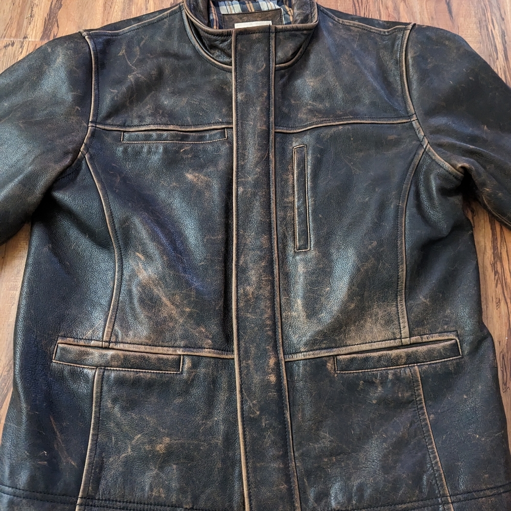 Black leather coat, Territory Ahead, Falcon Bluff sells for 799. Size large.